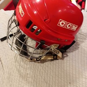 50-3) CCM hockey helmet with cage